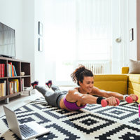Savvy Spending: Best On-Demand Fitness Apps and Programs workout-girl-plus-tv-computer