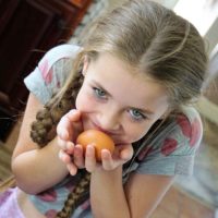 TDS supports Boys & Girls Club of Portage County Pexels_girl with egg
