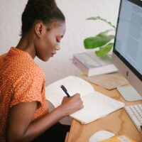 COVID-19 scams targeting college students woman student